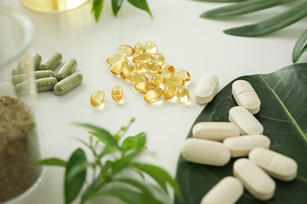 Alternative herb medicine. Herbal vitamin on white background