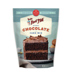 BOB483 | Bob's Red Mill decadent chocolate cake mix front pouch with a two-layer frosted chocolate cake slice