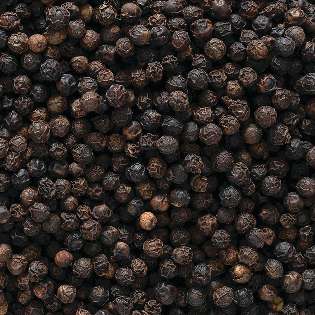 FNP039 | close-up of whole black peppercorns filling the frame - Thumbnail