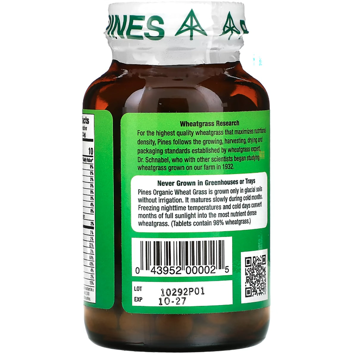 PNN012 | Brown bottle of Pines Organic Wheat Grass tablets with green label, barcode, and lot number