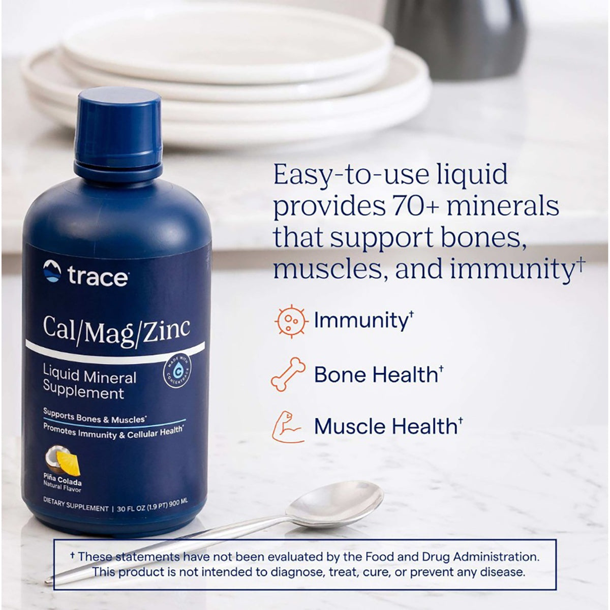 TM016 | Trace Cal/Mag/Zinc liquid mineral supplement bottle with benefits for immunity, bone health, and muscle health