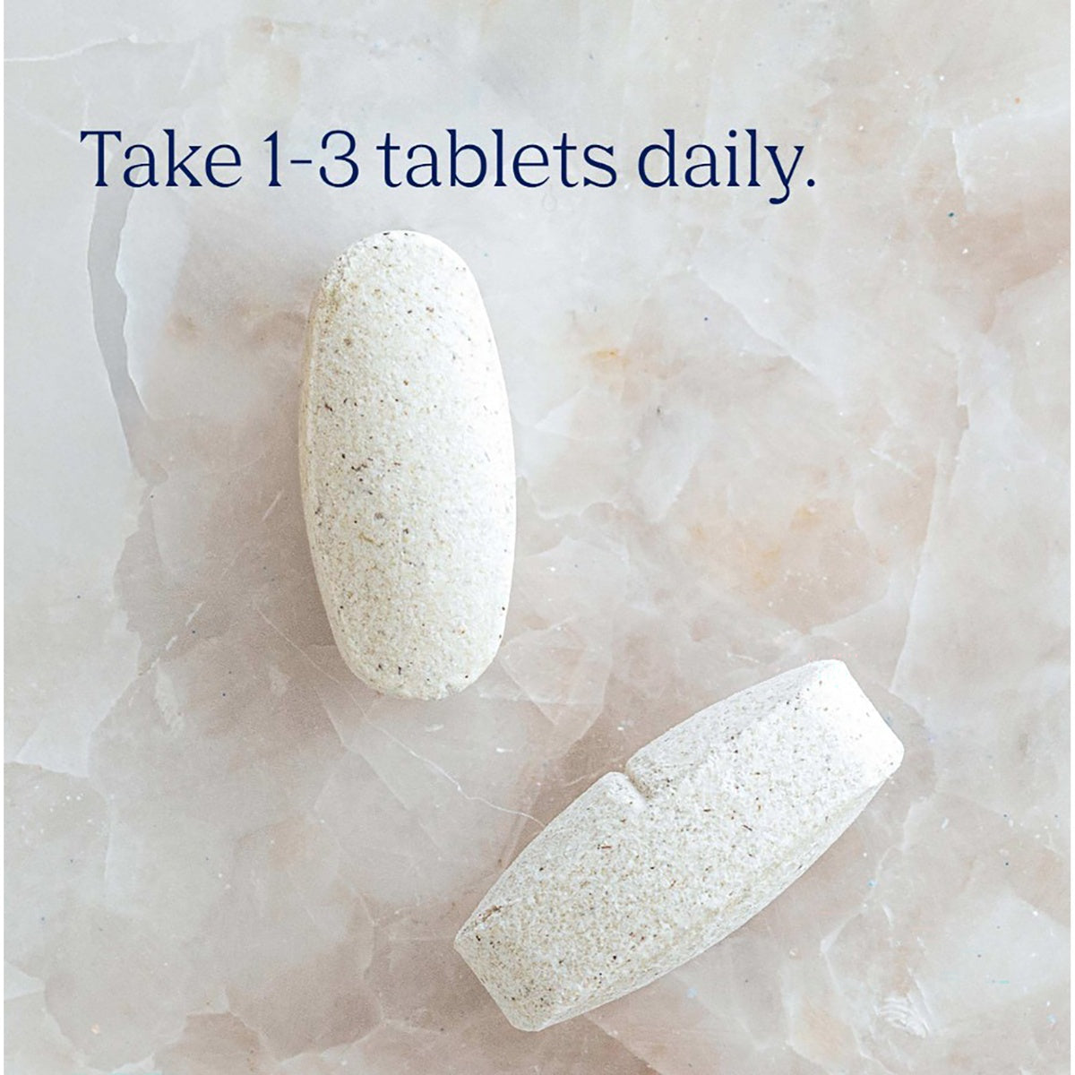 TM028 | Two tablets with the instruction, Take 1-3 tablets daily