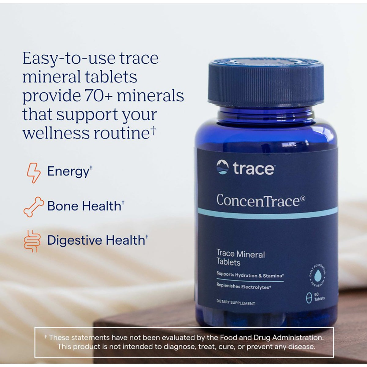 TM028 | Trace ConcenTrace trace mineral tablets bottle with benefits text for energy, bone health, and digestive health