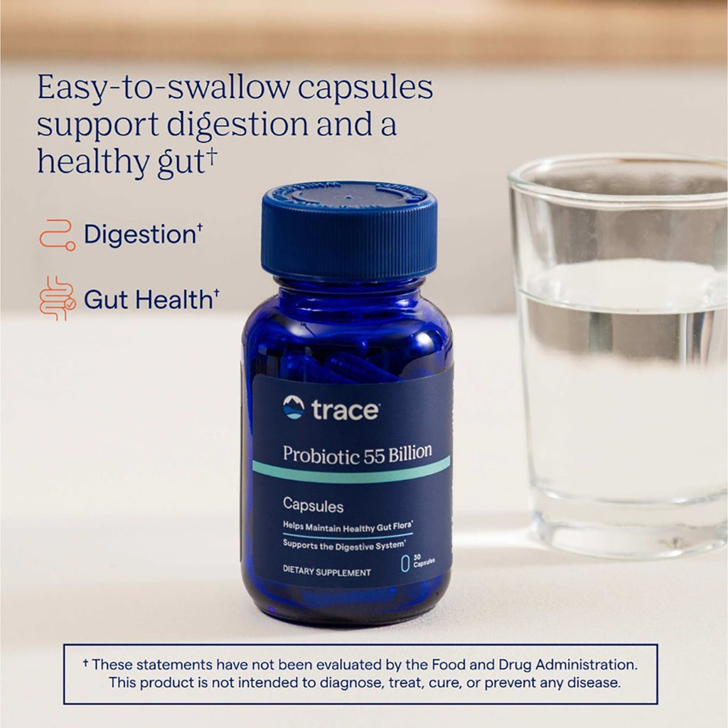 TM081 | Trace Probiotic 55 Billion capsules beside a glass of water, with digestion and gut health claims - Thumbnail