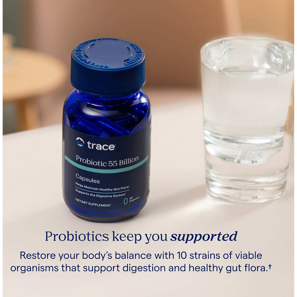 TM081 | Trace Probiotic 55 Billion capsules bottle beside a glass of water with support message - Thumbnail
