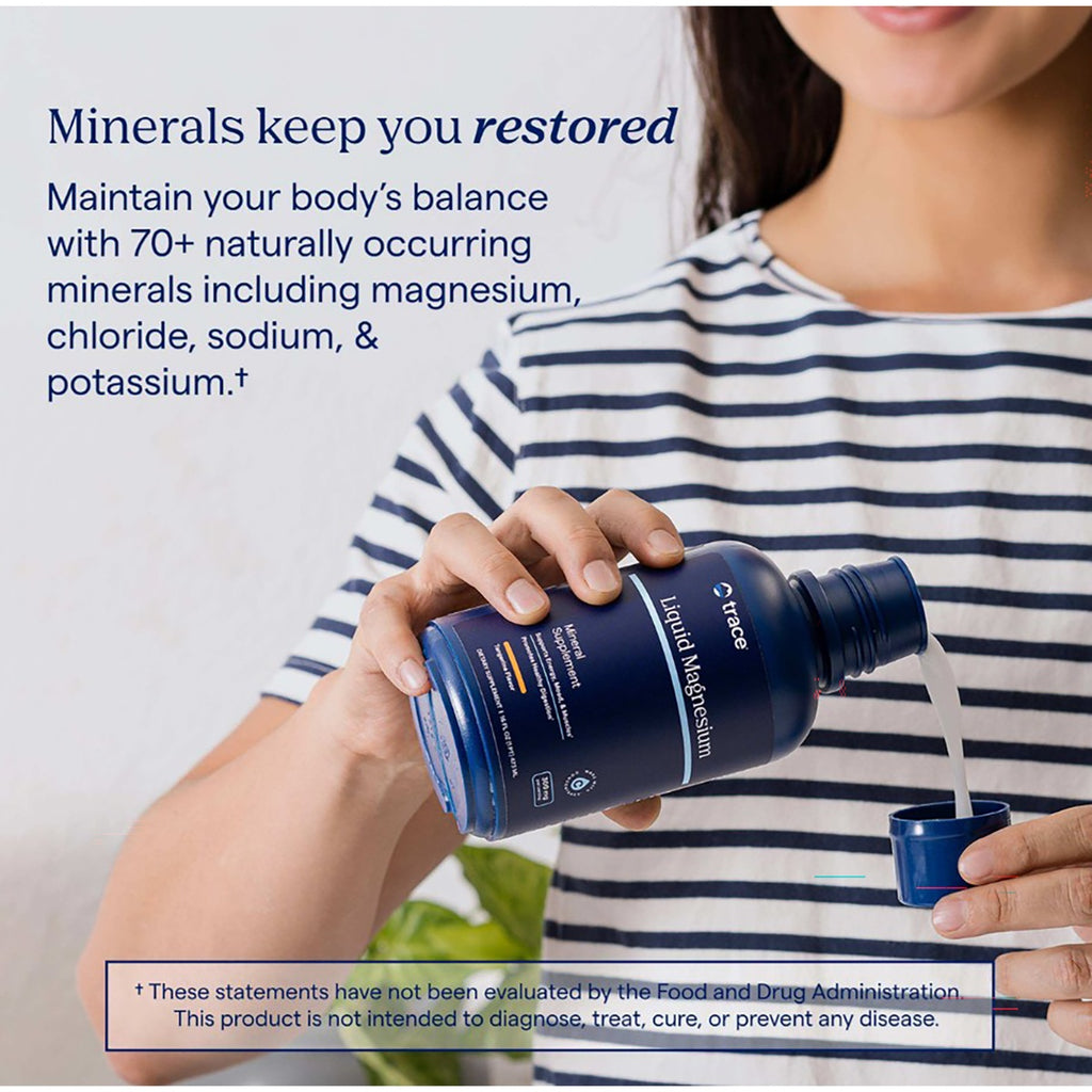 TM053 | Woman pours Trace Liquid Magnesium into a cup, with text about 70+ naturally occurring minerals - Thumbnail