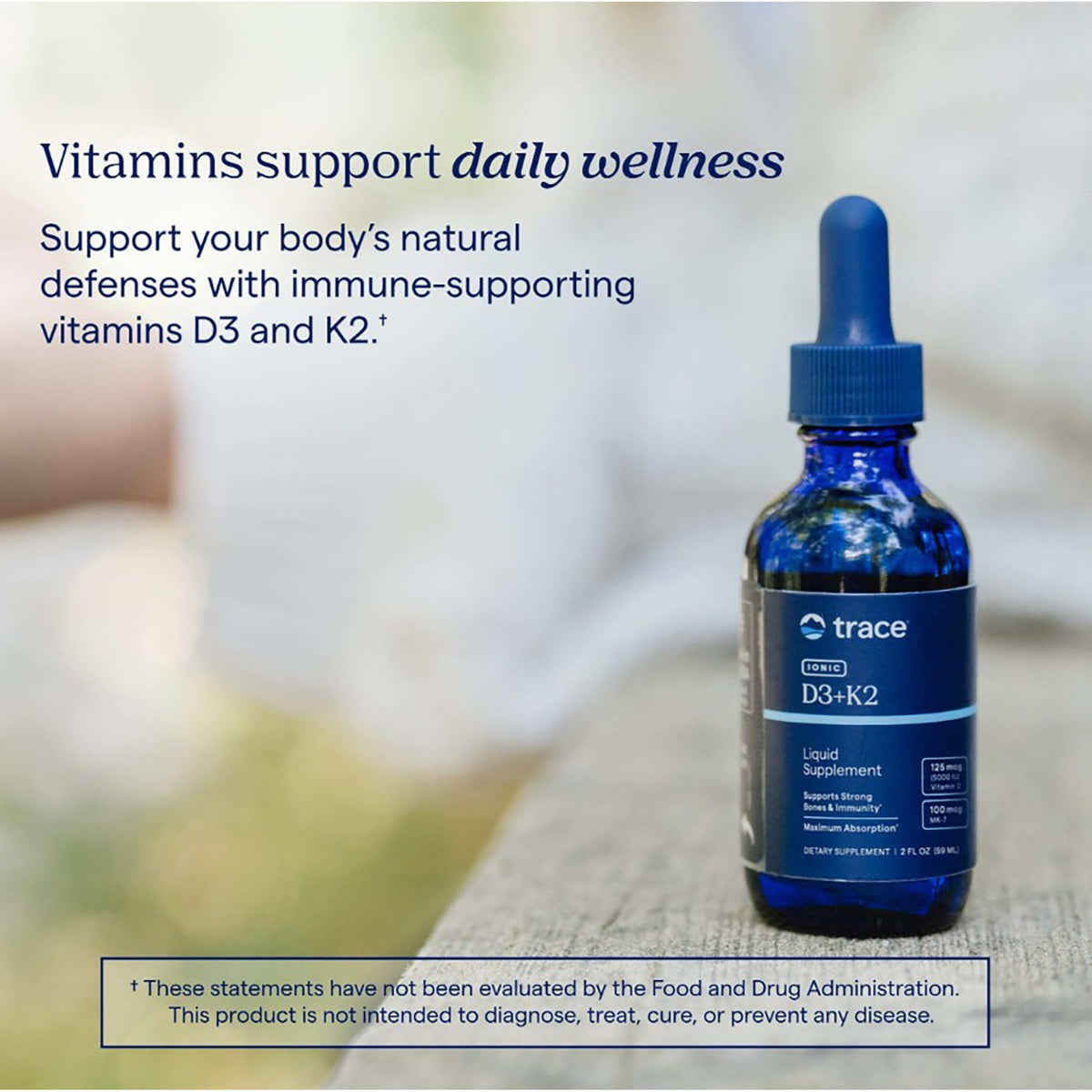 TM130 | Trace Ionic D3+K2 liquid supplement bottle with wellness message and dosage details