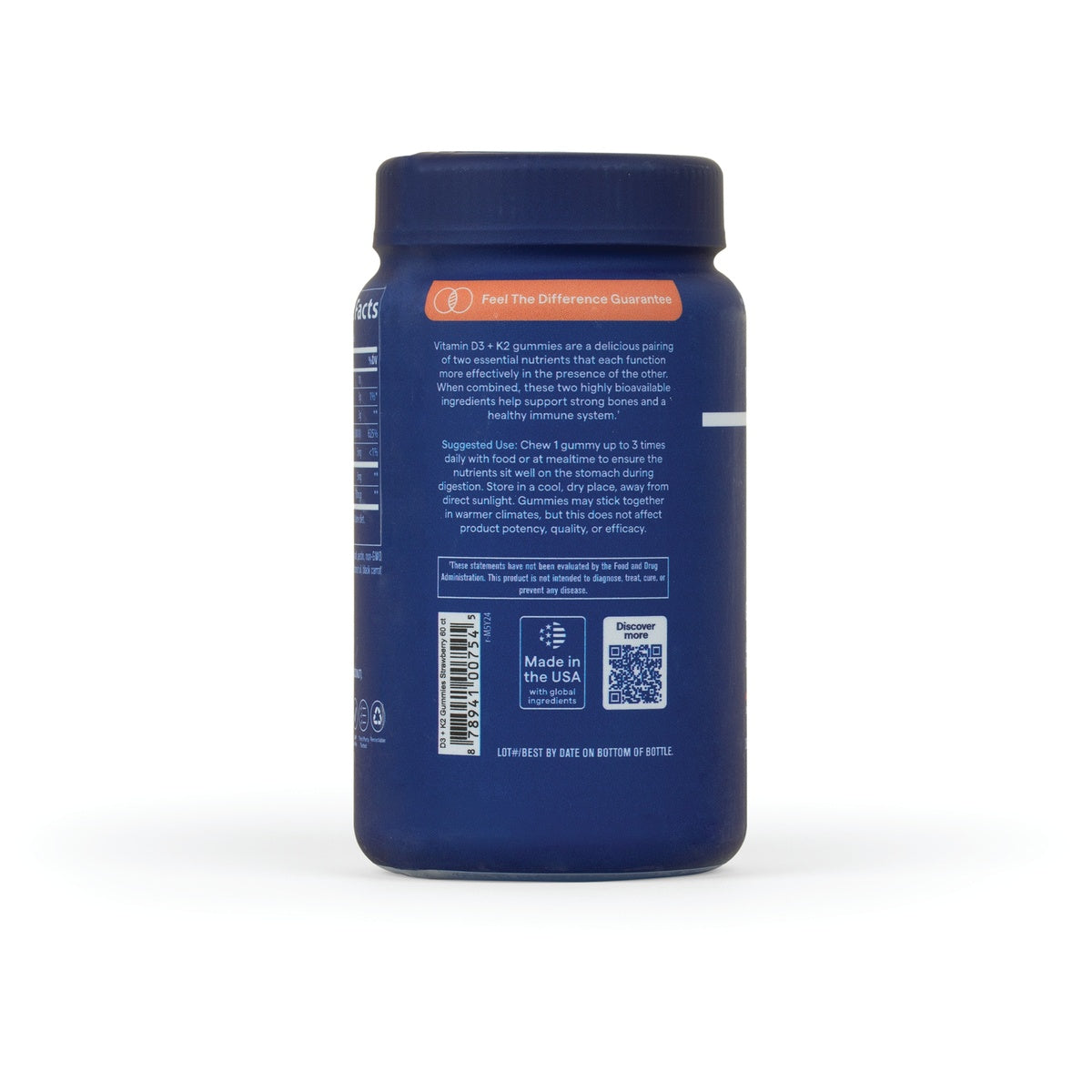 TM145 | Back of blue gummy vitamin bottle with directions, barcode, QR code, and Made in the USA badge