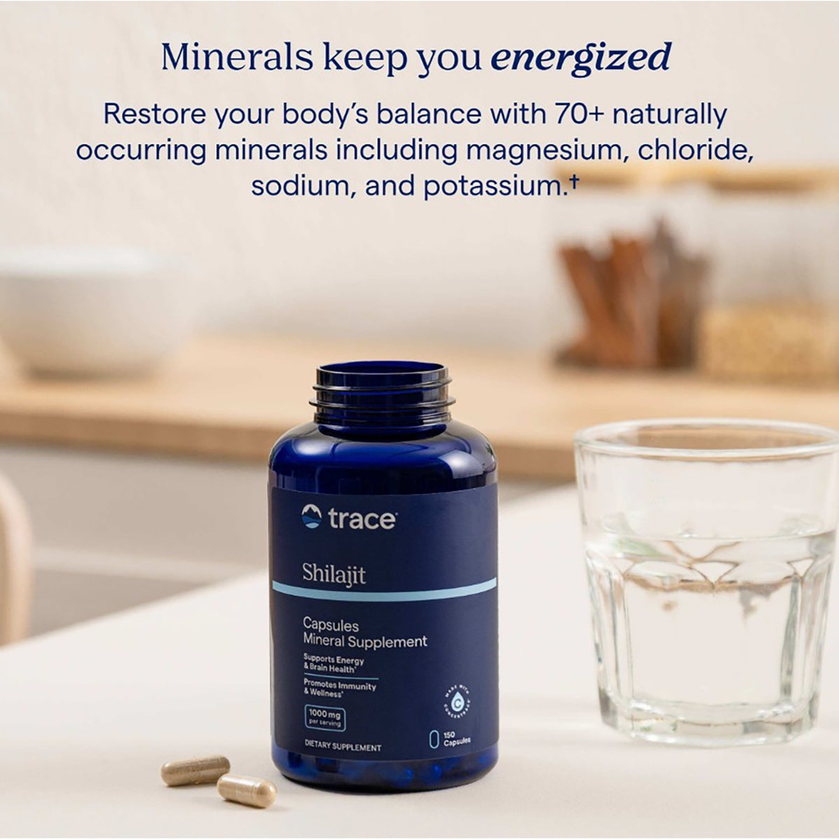 TM156 | Trace Shilajit capsules with glass of water and minerals keep you energized text