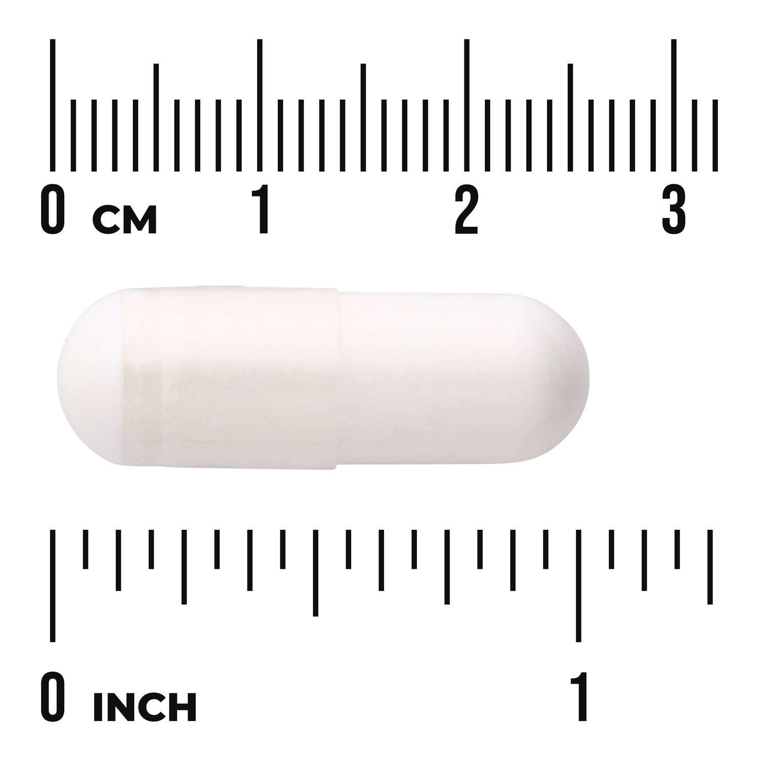 SWU931 | White capsule shown next to centimeter and inch rulers for size reference