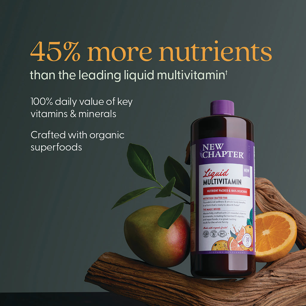 NWC393 | 45% more nutrients claim with New Chapter liquid multivitamin bottle, mango and orange on wood - Thumbnail