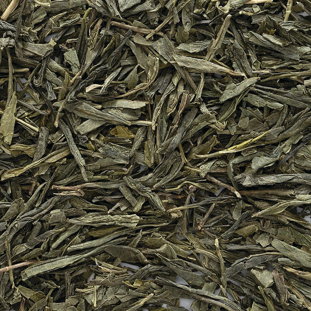 FNP086 | close-up of loose dried flat green tea leaves - Thumbnail
