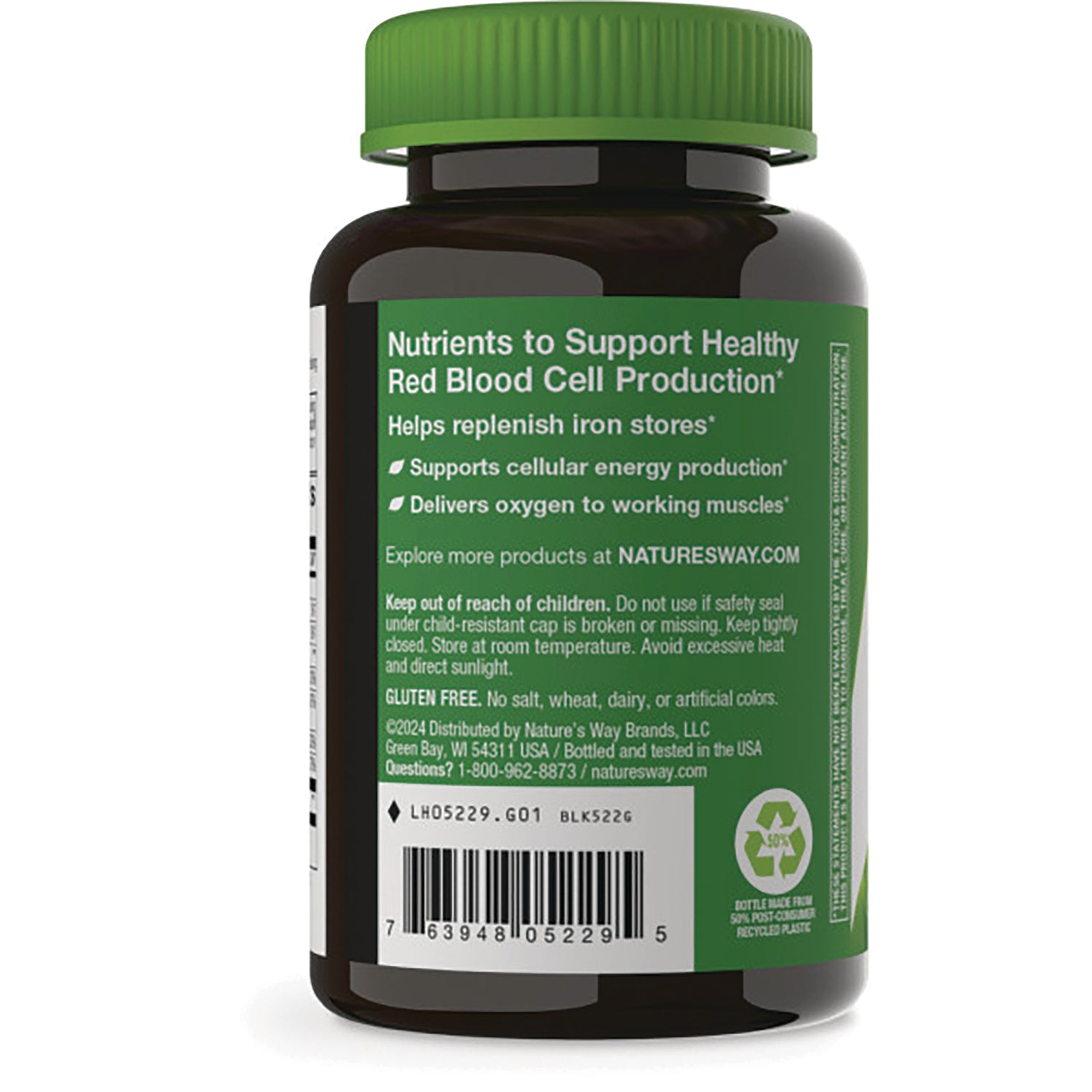 Brown supplement bottle back with green label reading nutrients to support healthy red blood cell production, barcode, and recycling symbol