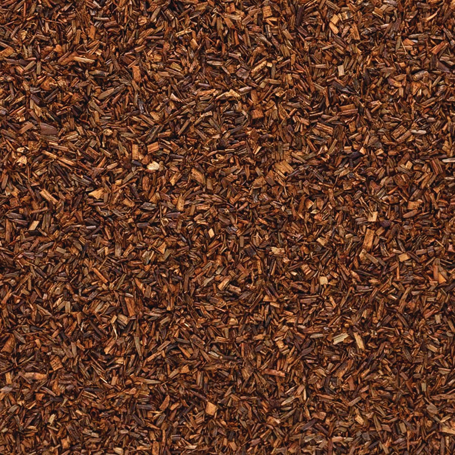 FNP030 | Close-up of loose reddish-brown rooibos tea leaves filling frame