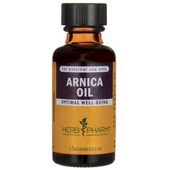 HPH002 | 1 fl oz amber glass bottle of Arnica Oil with black cap labeled Herb Pharm for external use only