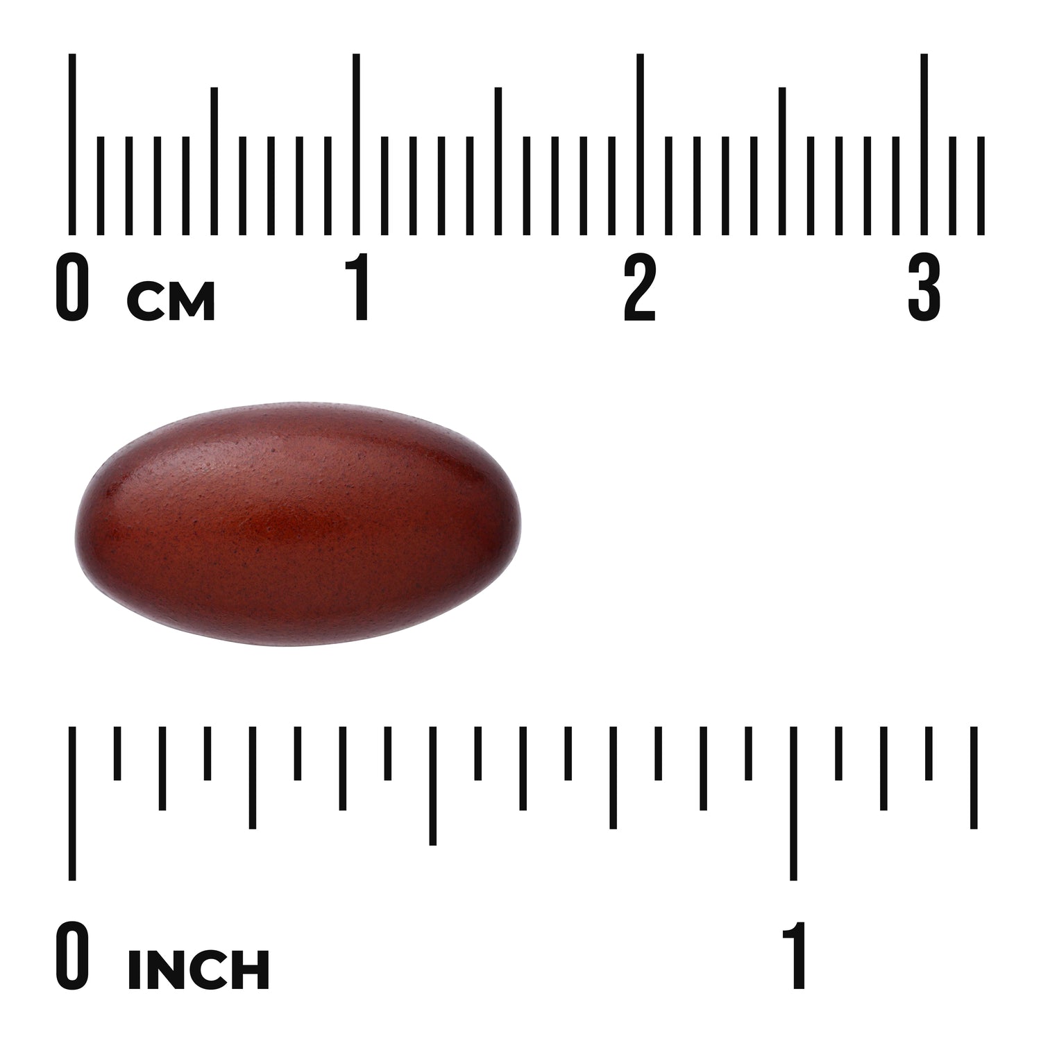 SWU393 | Brown softgel shown with centimeter and inch rulers for size