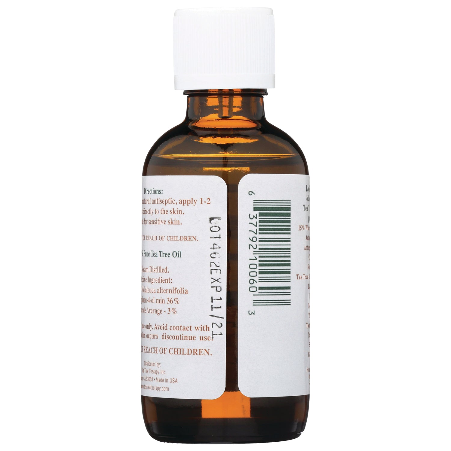 TTT023 | Back of amber tea tree oil bottle with white cap, barcode and directions on label