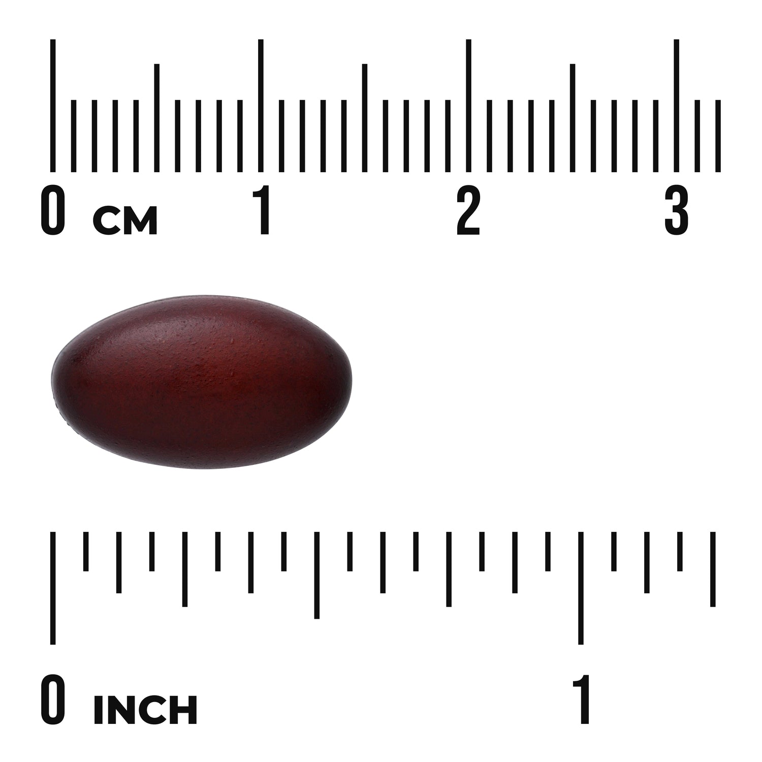 SW902 | Dark red softgel shown with cm and inch rulers to indicate size