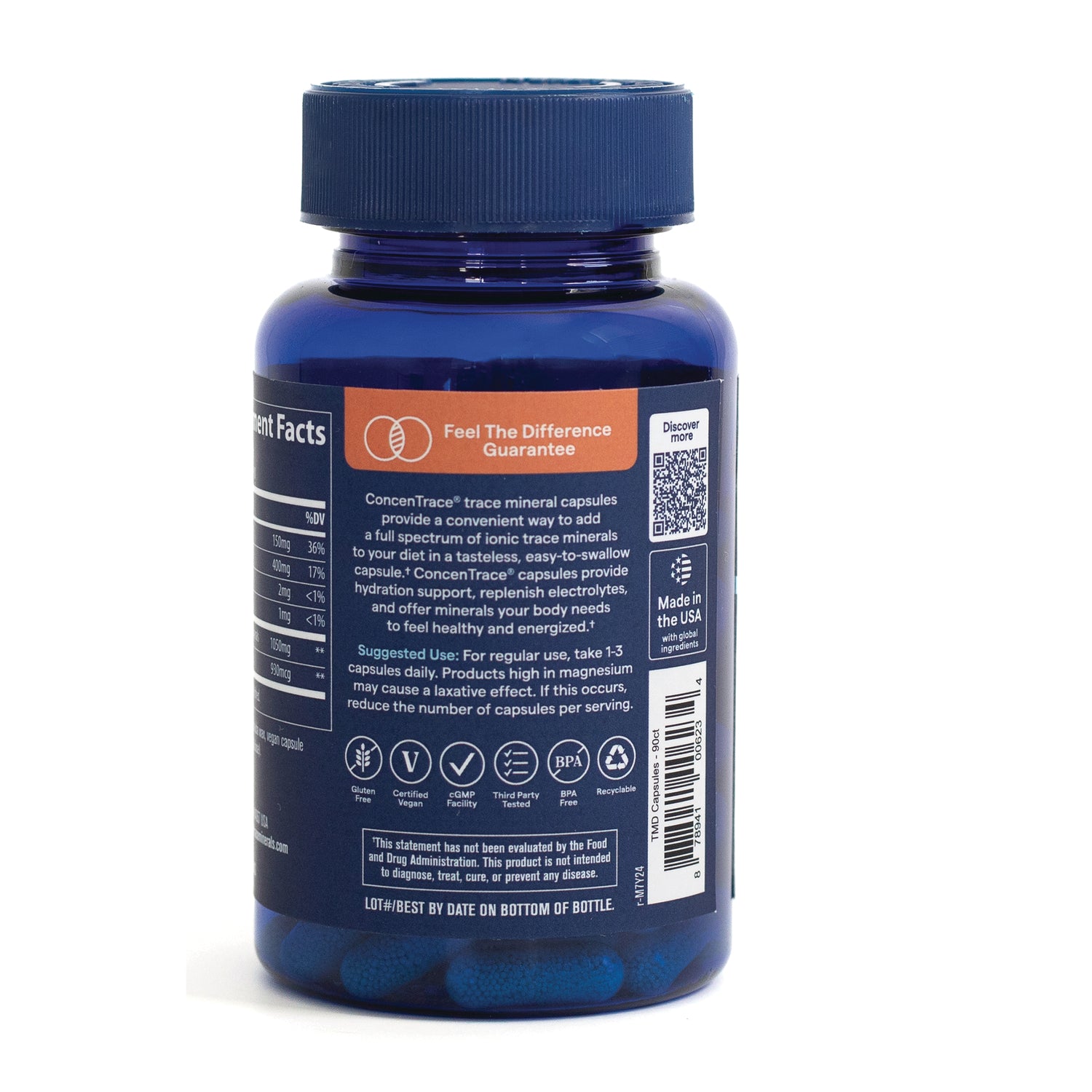 TM116 | Back of blue supplement bottle showing label, Feel The Difference Guarantee, QR code, and icons