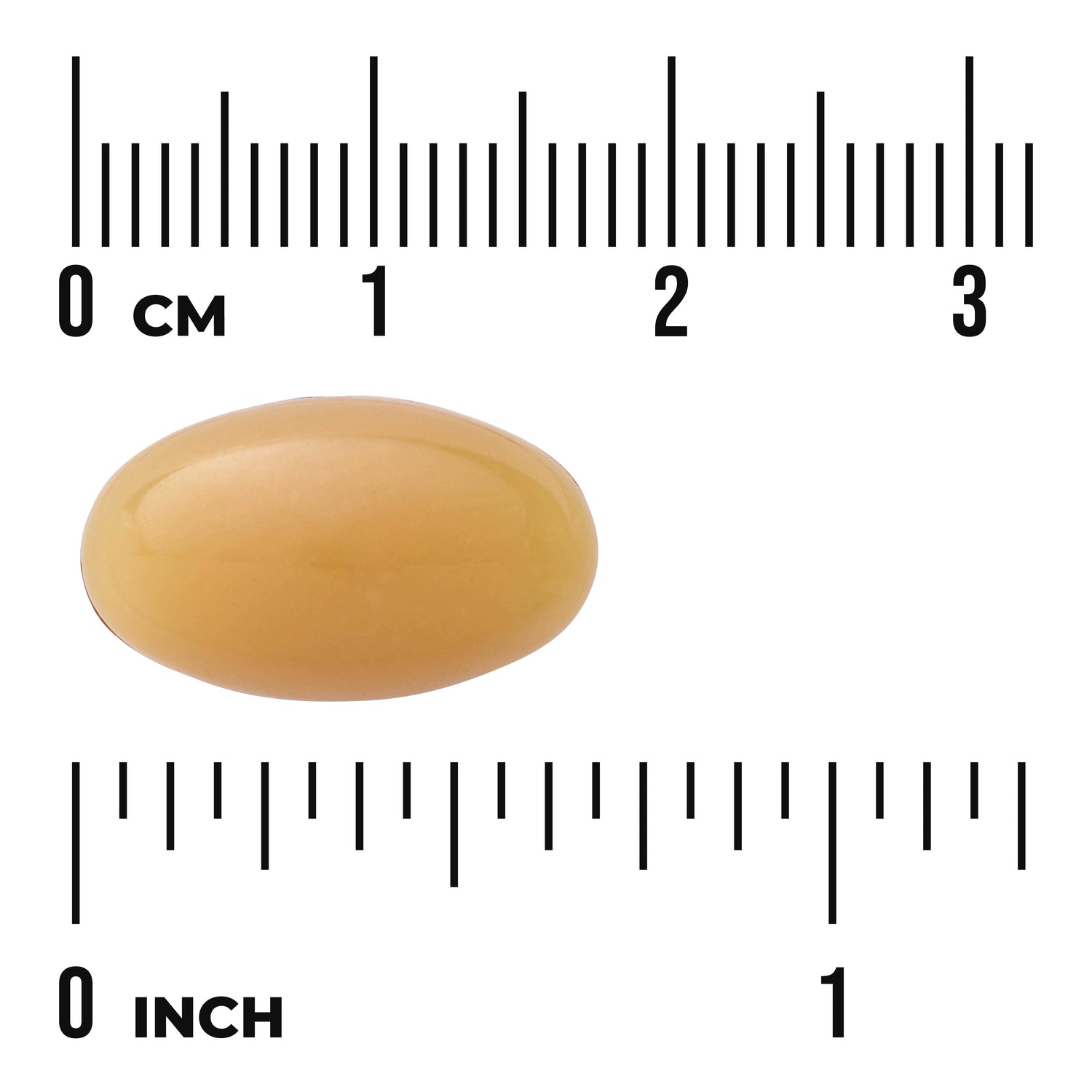 SWU732 | oval golden softgel capsule on rulers showing centimeters and inches for size reference