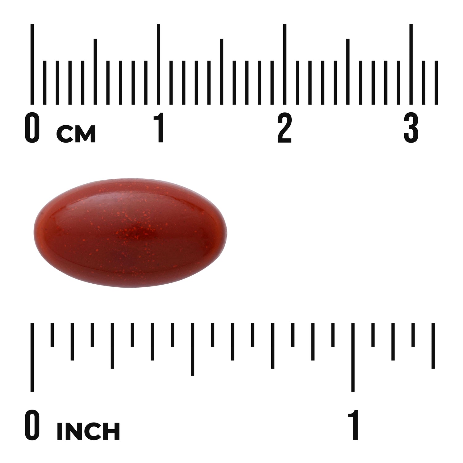 SWU868 | Red oval softgel with tiny flecks shown next to centimeter and inch rulers, about 1.6 cm long