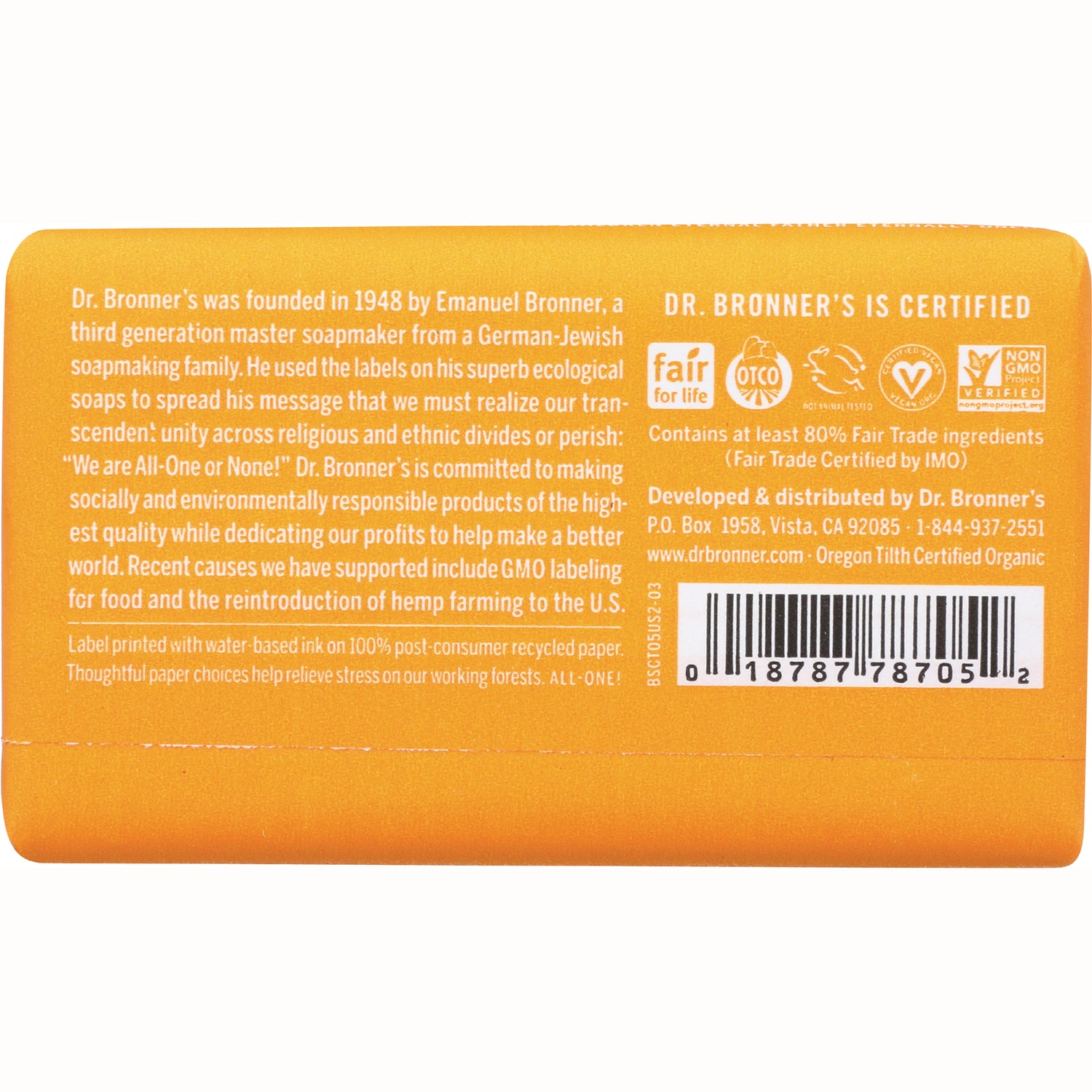 DRB020 | Orange soap bar back label showing company story text, certification icons and barcode