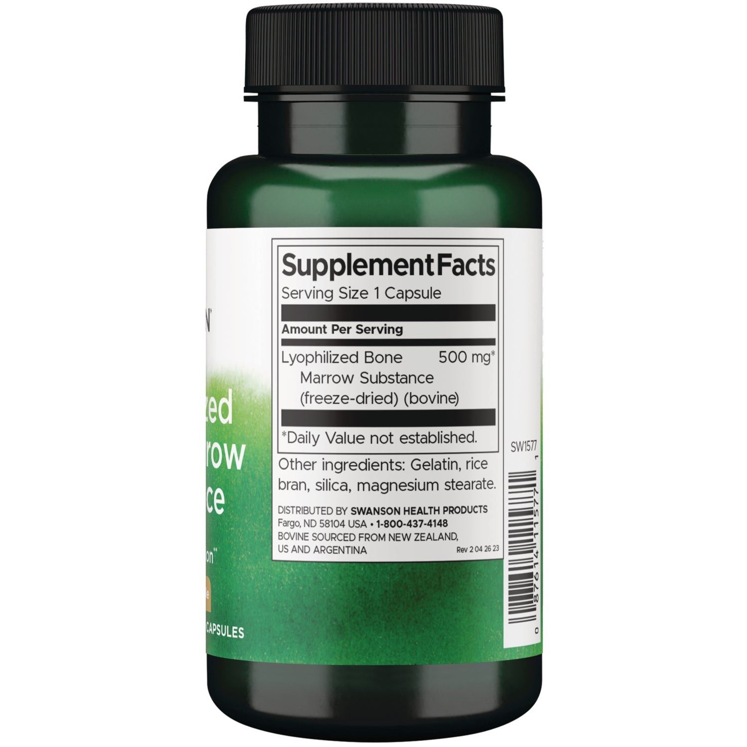 SW1577 | Beige supplement capsule beside rulers showing about 2 cm; visible text 'cm' and 'inch'