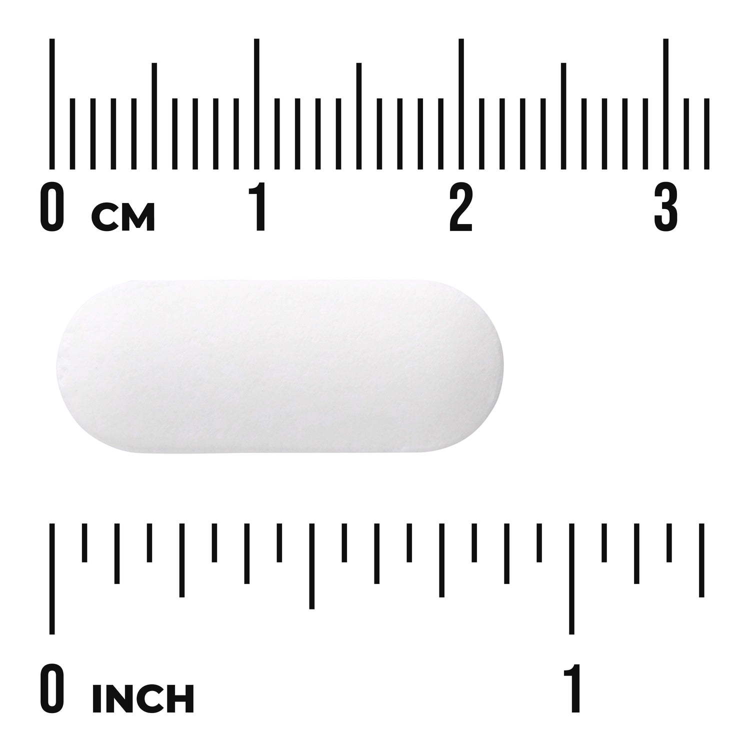 SW1364 | White oblong tablet on rulers labeled CM and INCH showing about 2.5 cm (1 inch) length