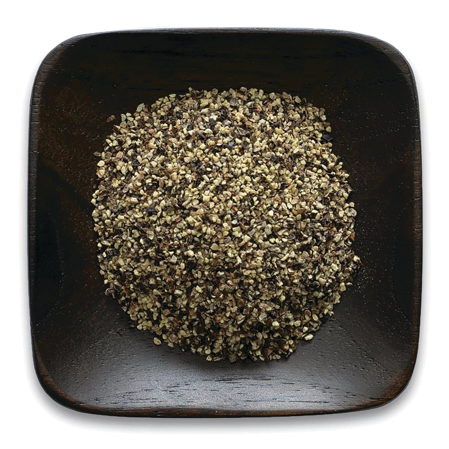 FNP061 | coarsely ground mixed peppercorns piled in a square dark wooden bowl