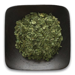 FNP073 | dried green herb flakes in a black square dish