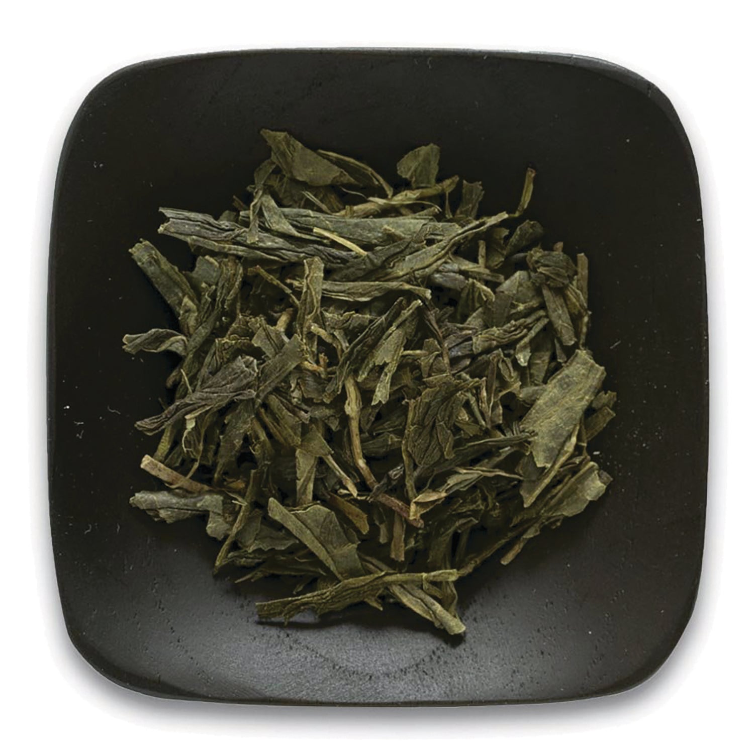 FNP084 | loose green tea leaves on a square black dish, top-down view