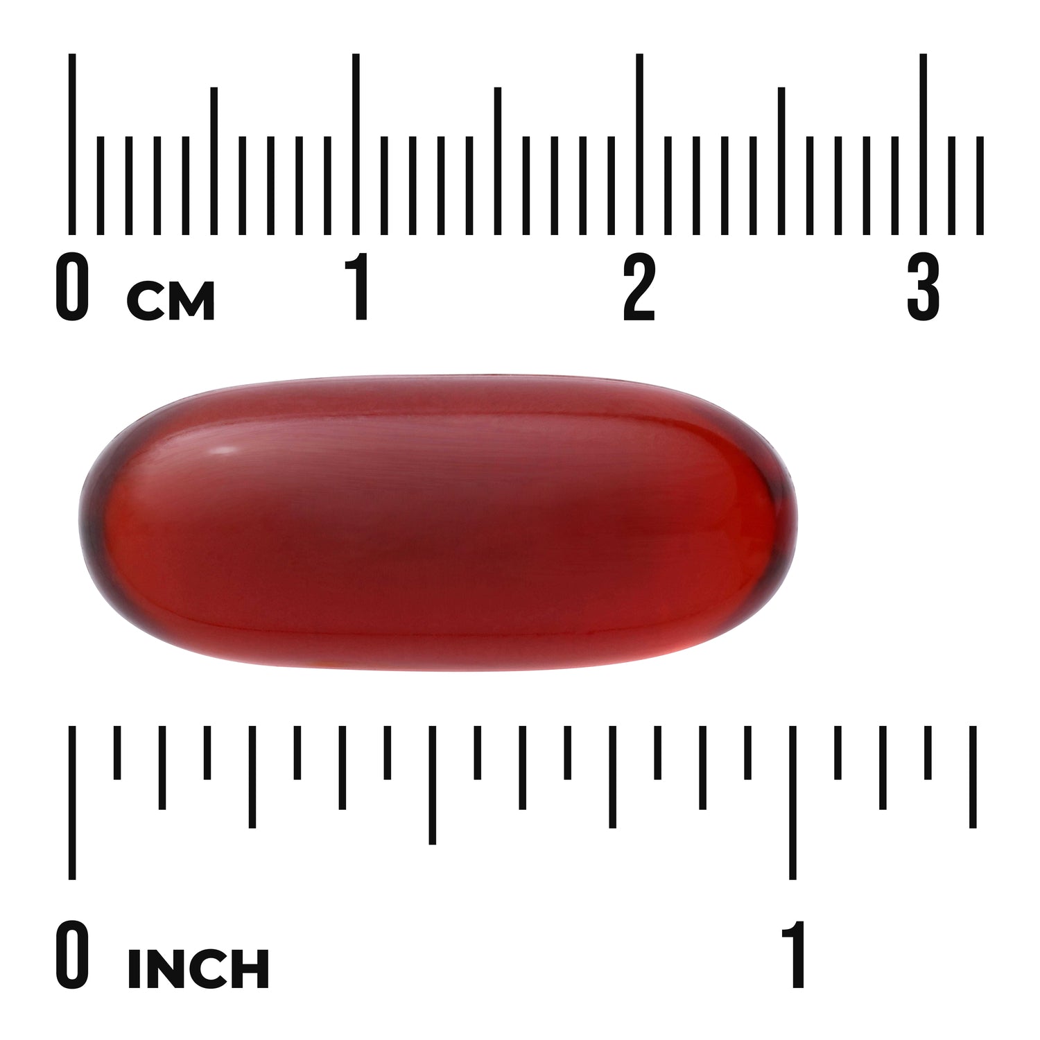 SWE065 | Red oval softgel capsule on white background with centimeter and inch rulers for size reference