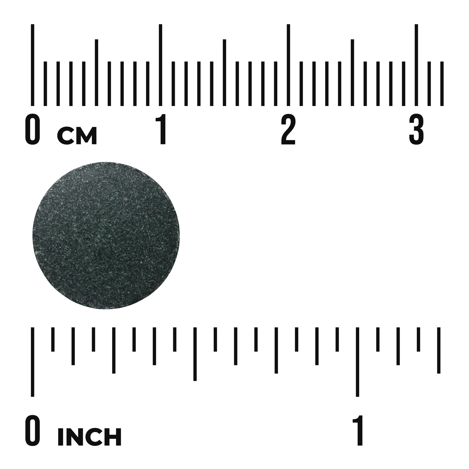 SWR010 | Round dark tablet shown with centimeter and inch rulers for size reference