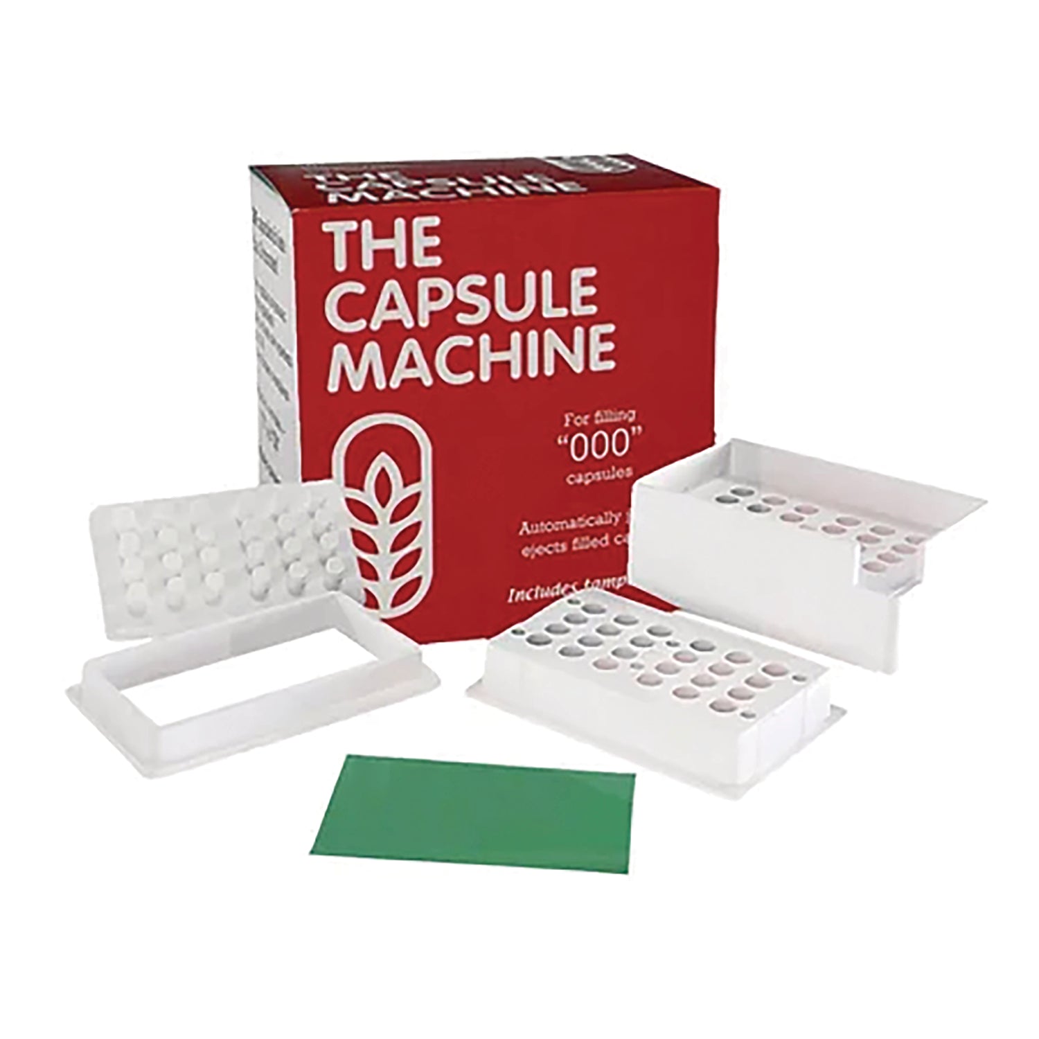 CPC003 | Red box labeled THE CAPSULE MACHINE with white capsule filling trays and accessories