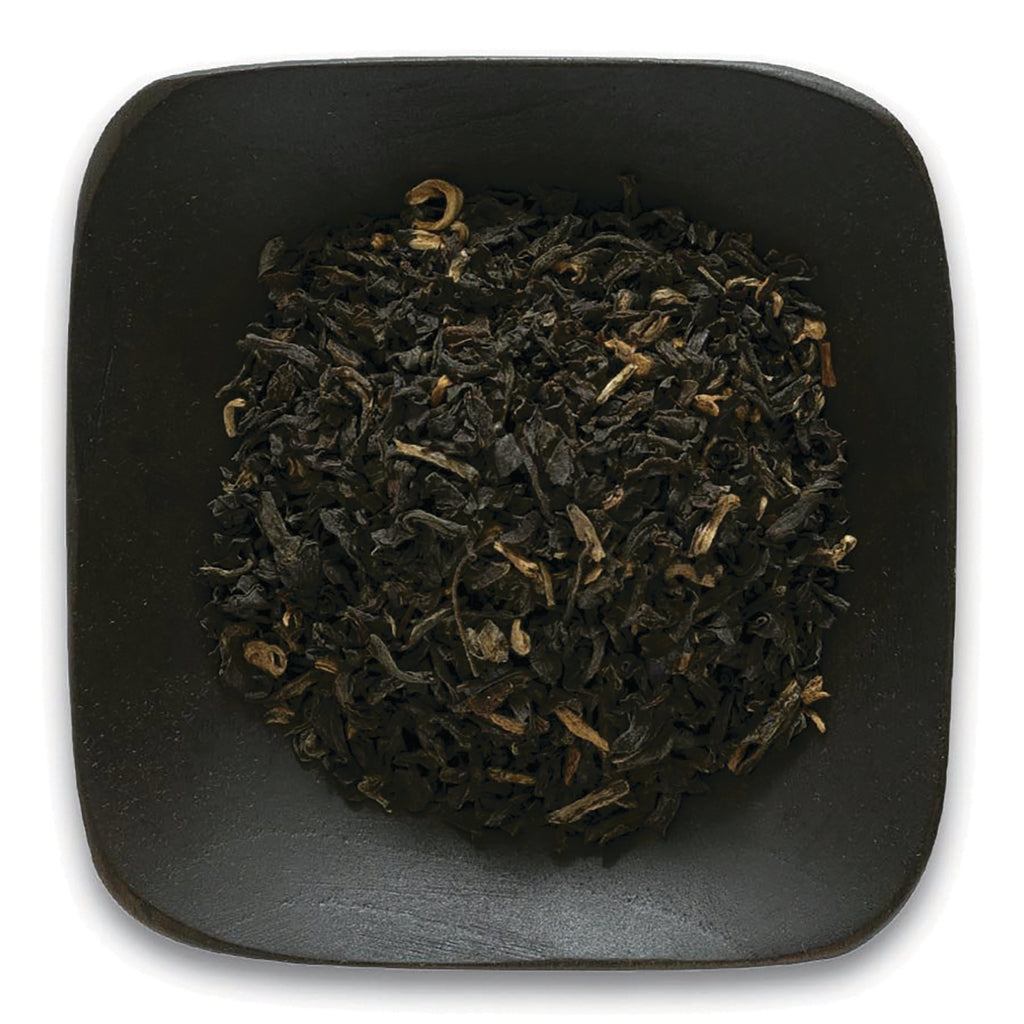 FNP026 | loose black tea leaves on a dark square dish - Thumbnail