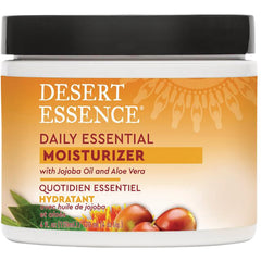 Desert Essence Daily Essential Moisturizer jar with black lid, label reads Daily Essential Moisturizer with Jojoba Oil and Aloe Vera
