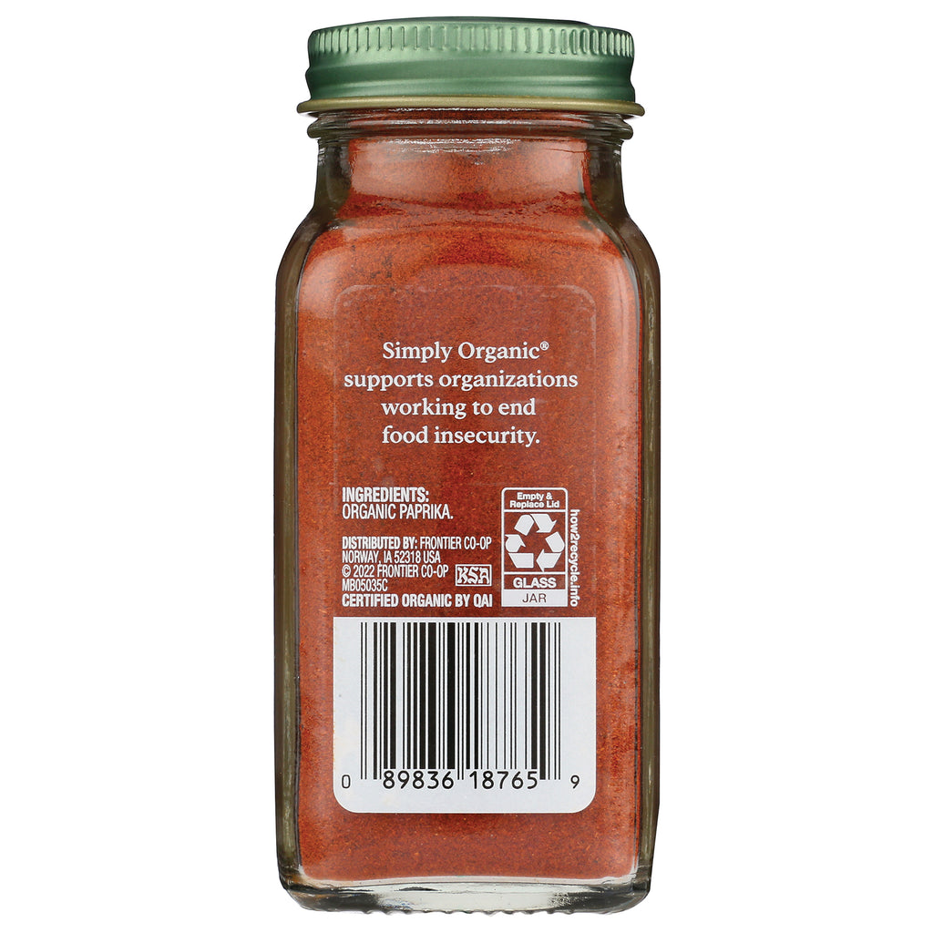 Back of glass jar of organic paprika showing ingredients text, recycling symbol and barcode - Thumbnail