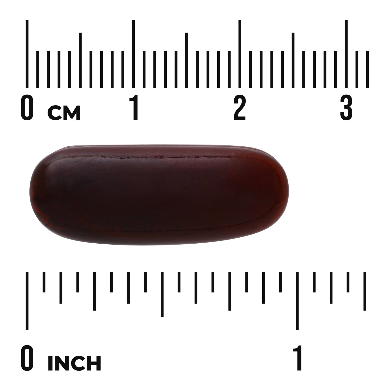 SWU323 | Brown oval softgel shown next to cm and inch rulers for size reference