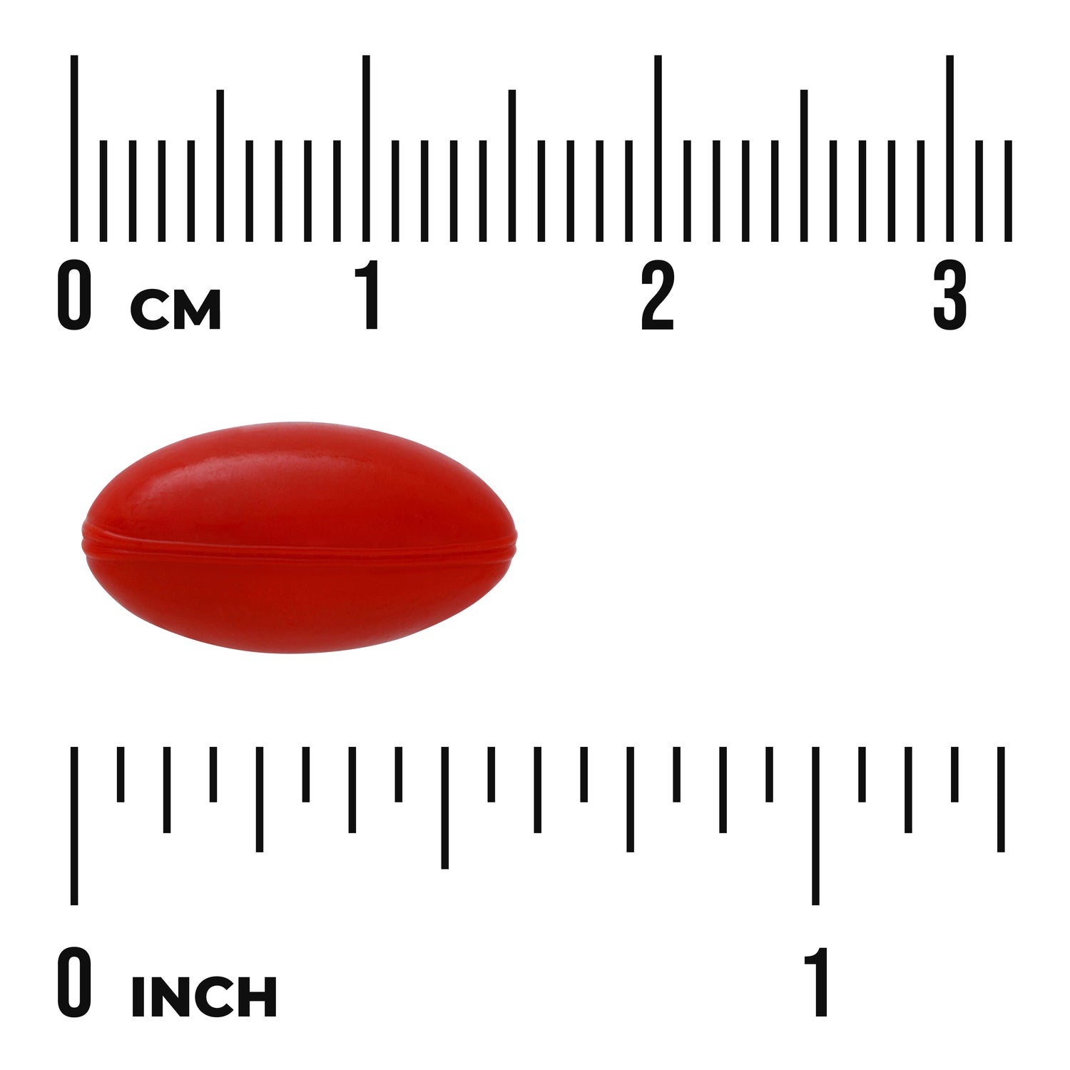 SWU986 | red oval softgel shown against centimeter and inch rulers for size reference