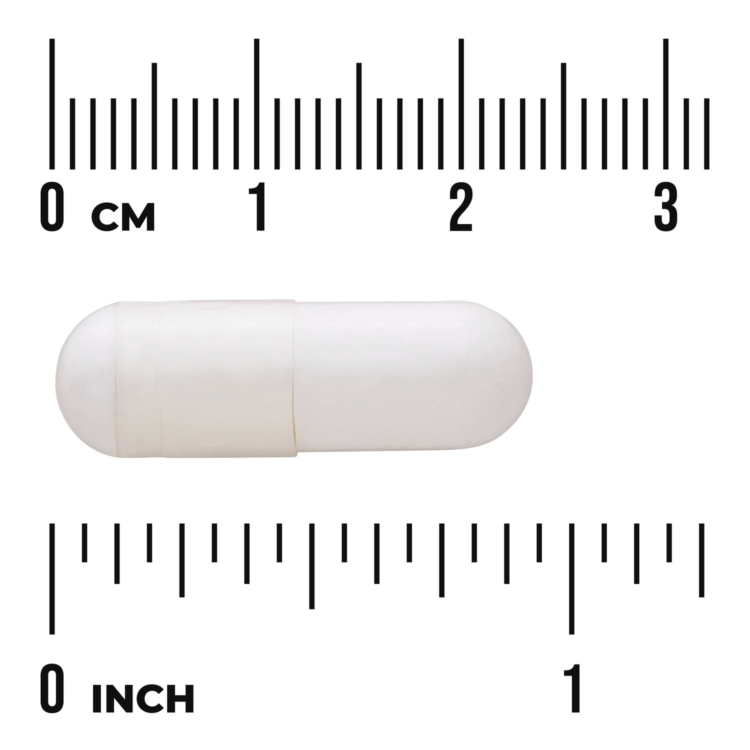 SWA032 | White capsule shown to scale with cm and inch rulers