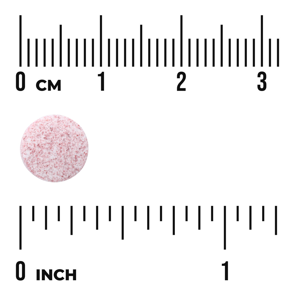 SWU907 | Pink speckled round tablet beside centimeter and inch rulers showing scale - Thumbnail