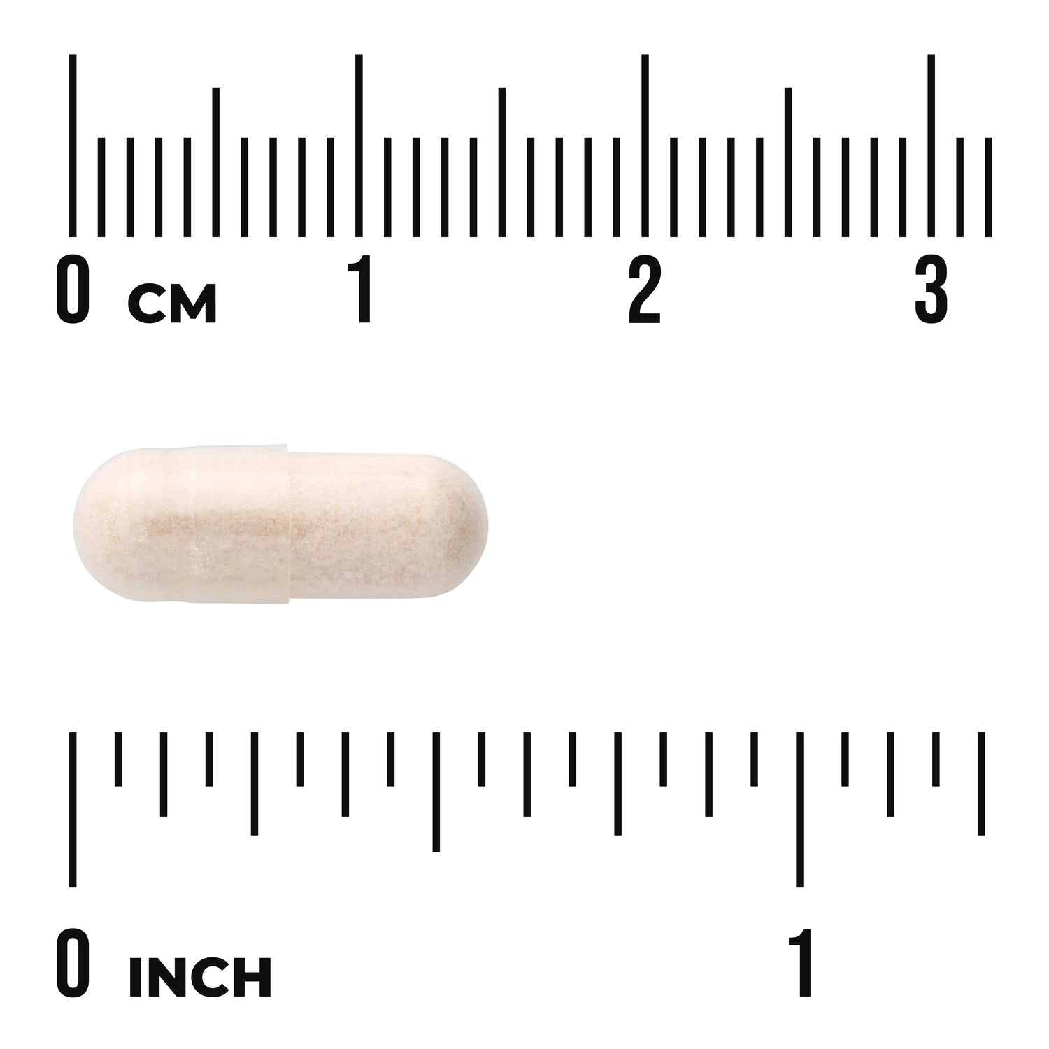 SWU536 | White supplement capsule beside centimeter and inch rulers showing size, visible text "0 cm" and "0 inch"