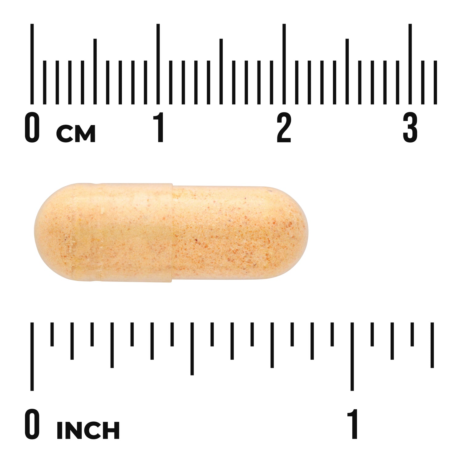 SWU815 | yellow speckled capsule centered between centimeter and inch rulers showing size