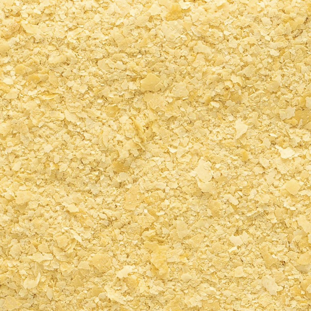 FNP021 | close-up of pale yellow flakes and fine crumbs - Thumbnail