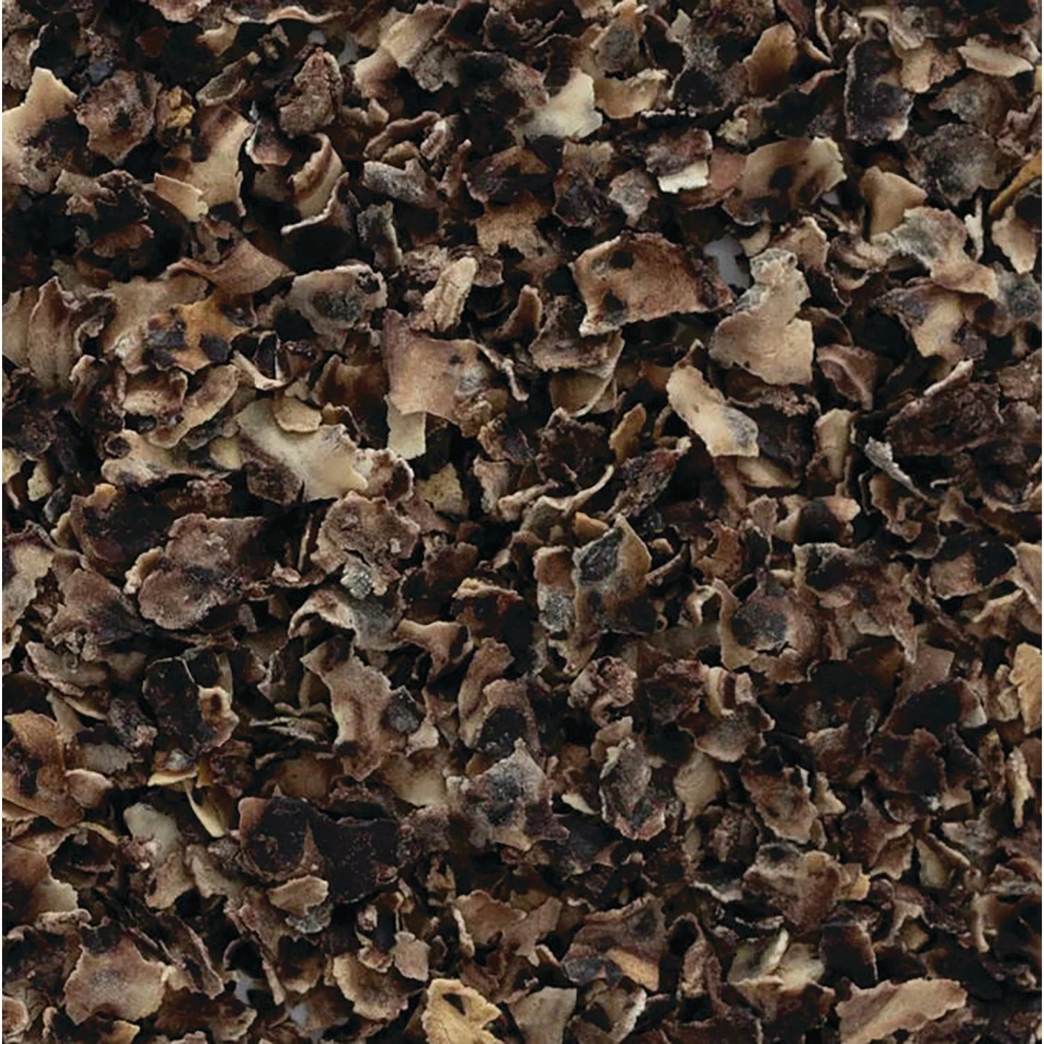 FNP389 | close-up of dark brown dried flakes texture