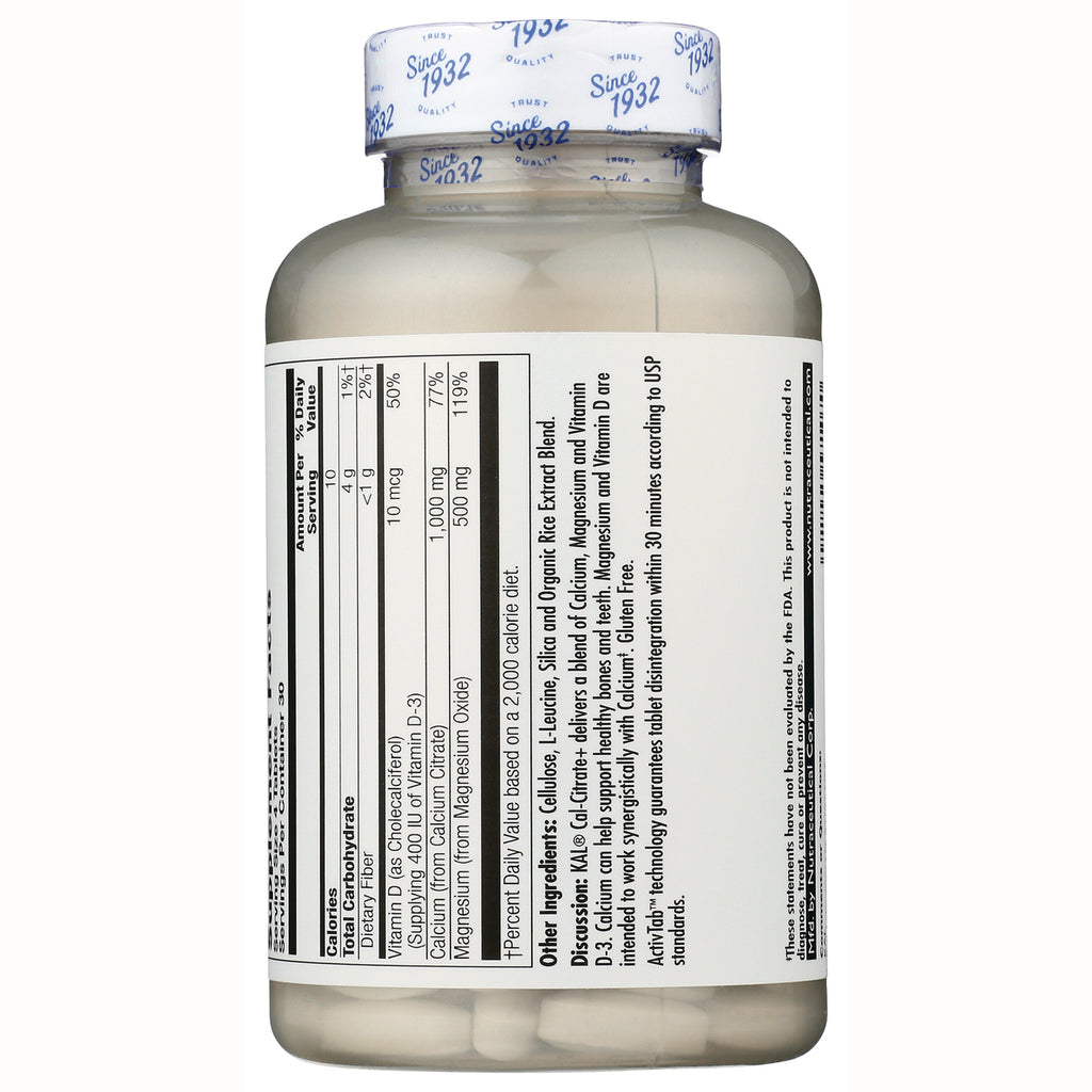 Back of supplement bottle showing nutrition facts panel and ingredient list with white tablets visible through clear bottle - Thumbnail