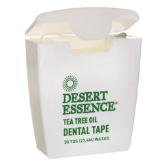 DST076 | white Desert Essence tea tree oil dental tape container with flip-top lid open, green logo and front label