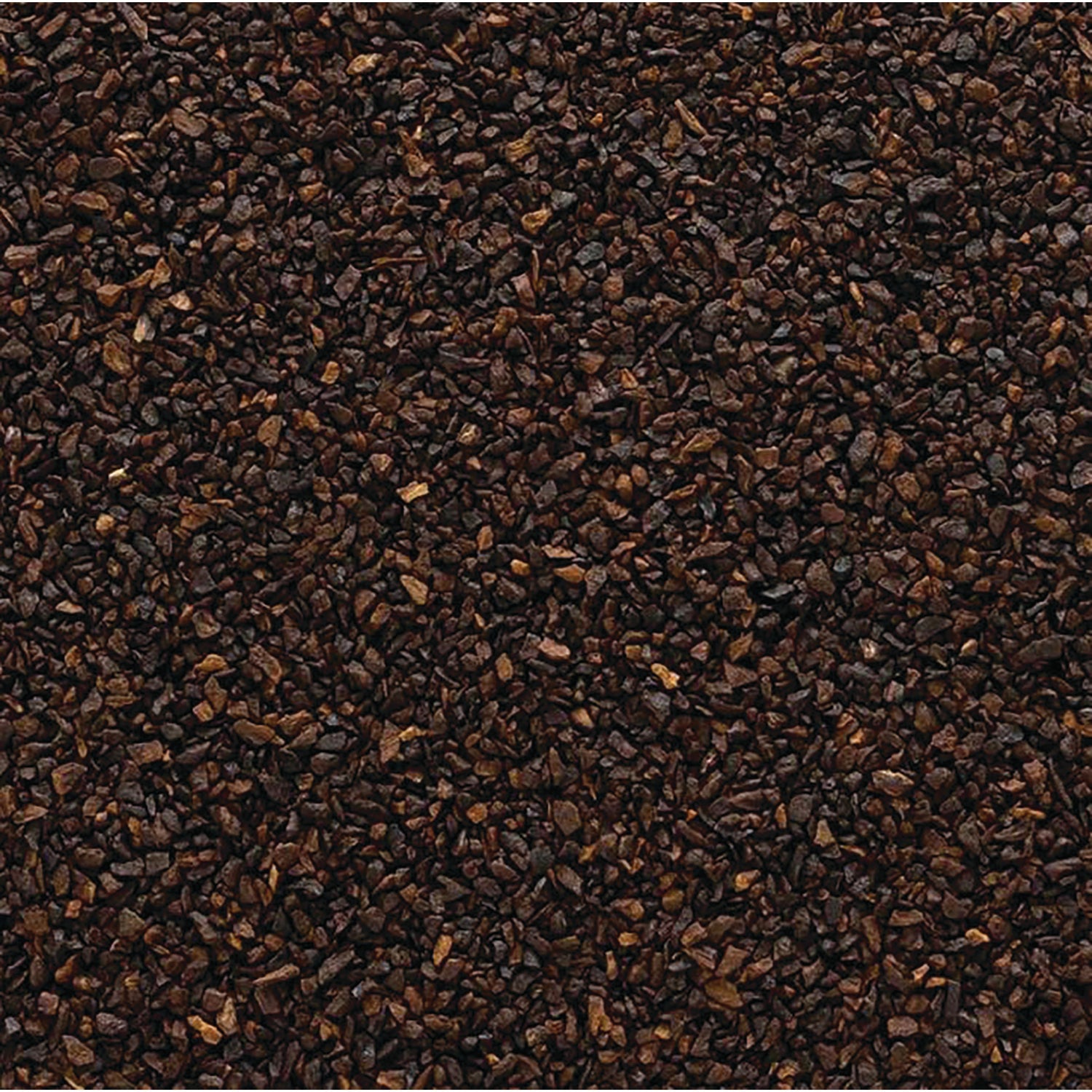 FNP385 | close-up of dark brown loose granules texture