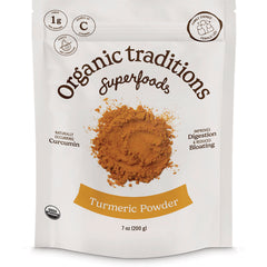 OTR069 | Organic Traditions Turmeric Powder 7 oz pouch front with a pile of turmeric powder