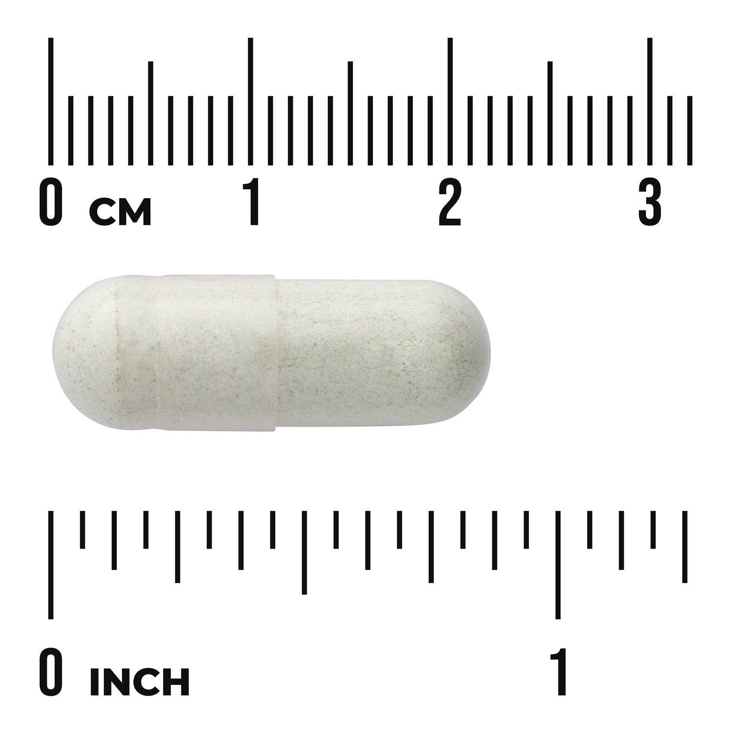 SWU809 | White capsule shown with centimeter and inch ruler for size reference